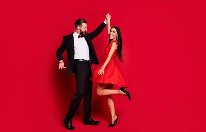 A woman dancing in high heels