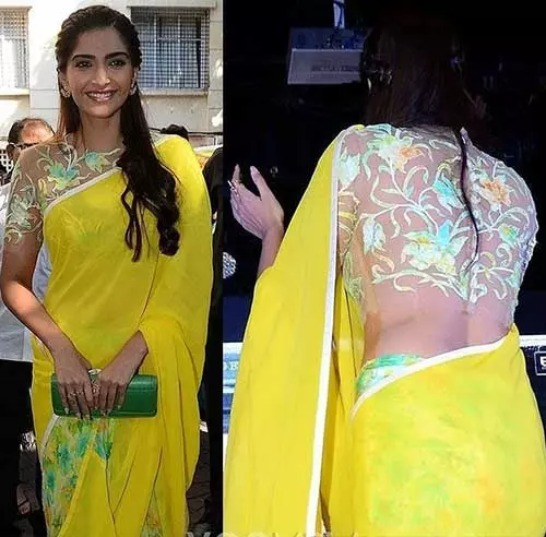 Plain yellow chiffon saree with a sheer designer blouse