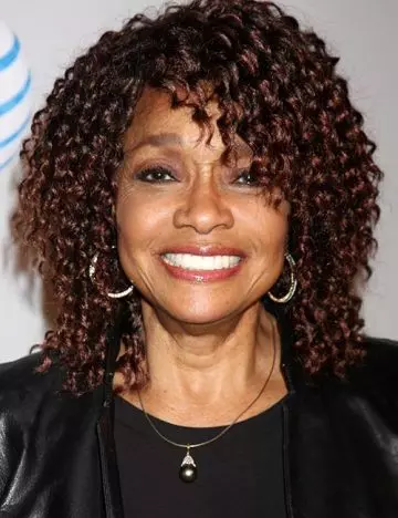 Kinky curls hairstyle for women over 60