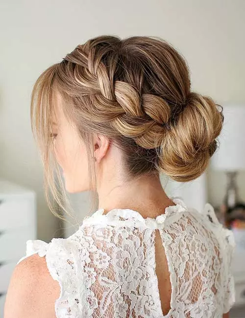 Low Bun With A French Braid