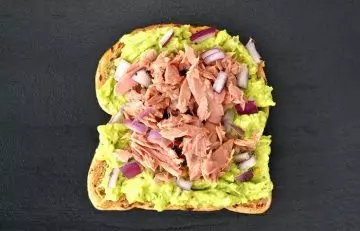An open tuna sandwich food after a morning run