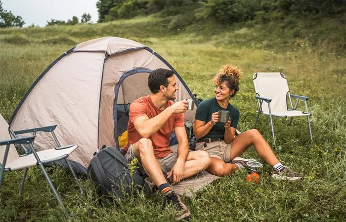 A happy couple camping