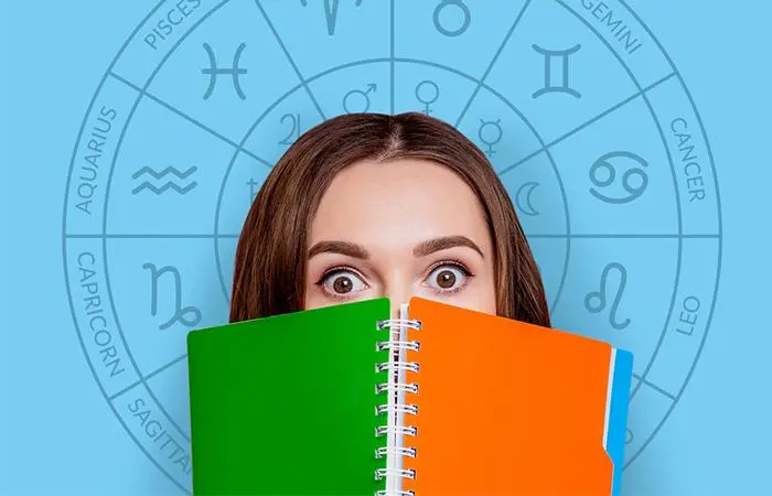 A woman reading her horoscope