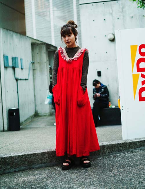 Red flared tunic with fringed neckline from Japanese clothing brand Beams