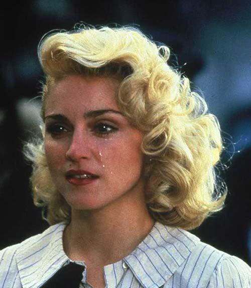 Cabelo clássico de Madonna com um só lado