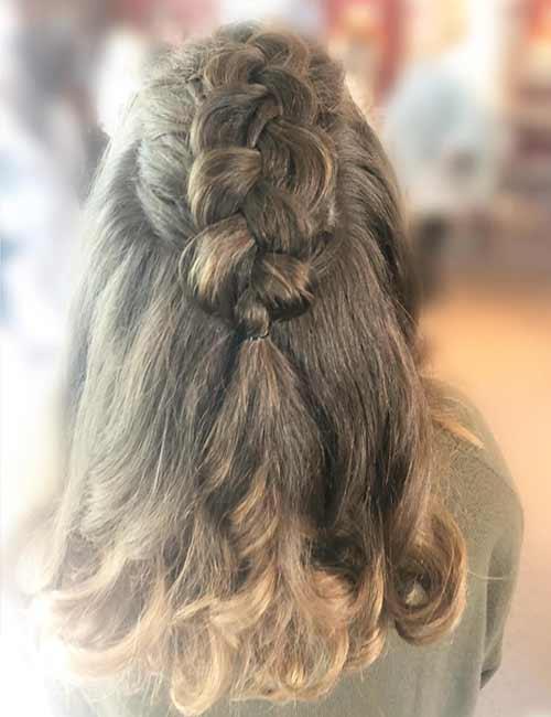 Half Dutch braid hairstyle