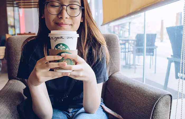 Having Coffee In Plastics Cups