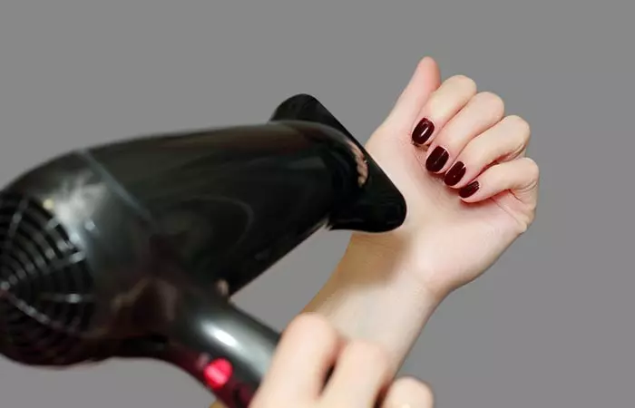 Use a blow dryer to dry your nail polish faster