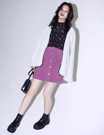 Black top purple skirt and white lose jacket from Japanese clothing brand WEGO