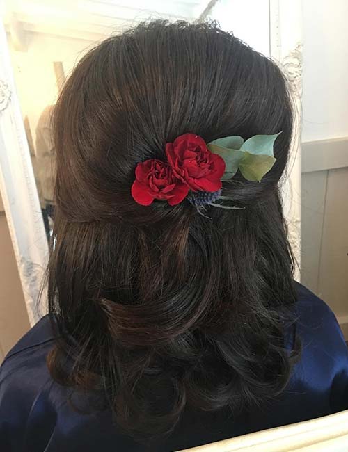 Accessorized half up-half down hairstyle