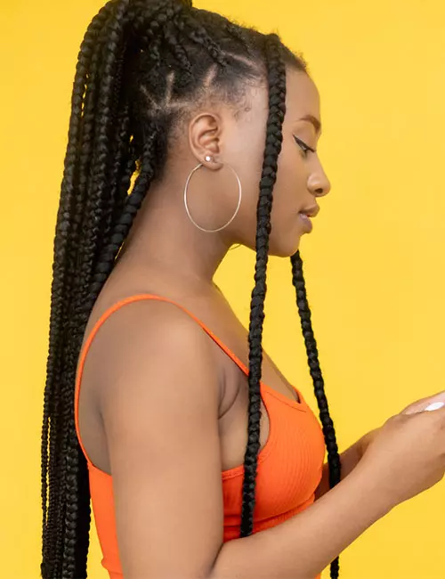 Braided high ponytail protective hairstyle