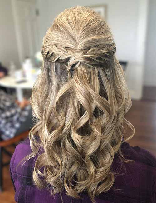 Braided pouf half up-half down hairstyle