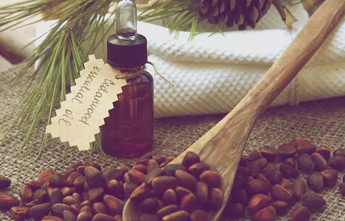 A bottle of cedarwood essential oil for hair