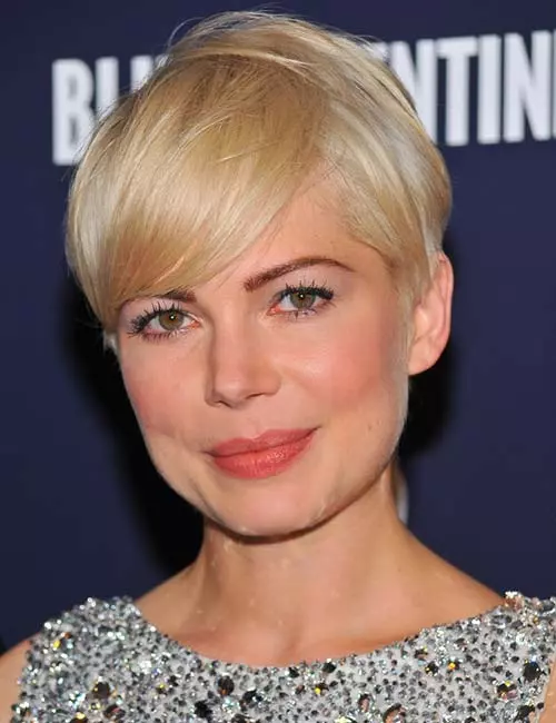 Short classic pixie cut with soft fringe bangs