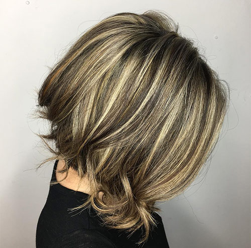 Inverted bob haircut with curly ends