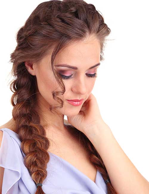 Intricate side braid hairstyle for weddings and formal events