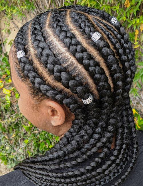 Side cornrows protective hairstyle