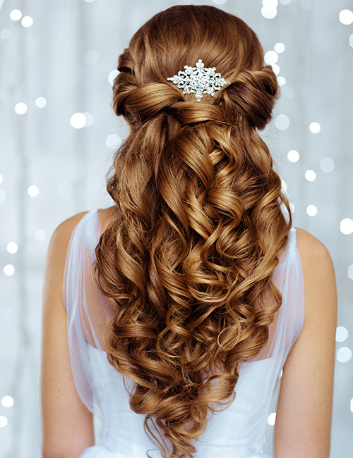 Twisted and curled half up-half down hairstyle