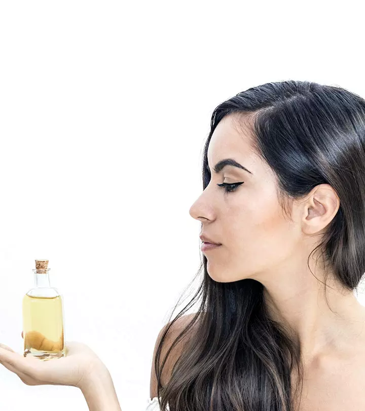 woman with argan oil for hair growth