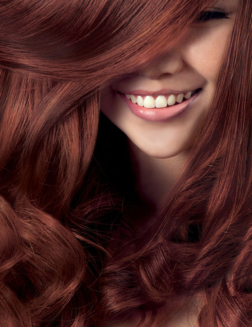 Woman with bright rose brown hair 