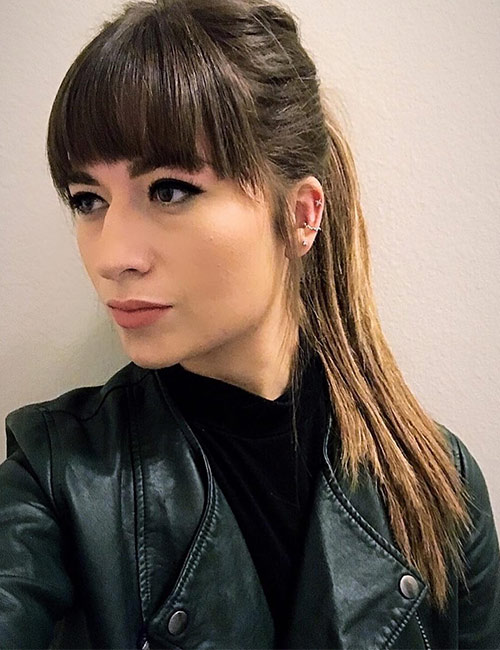 Curved blunt bangs hairstyle