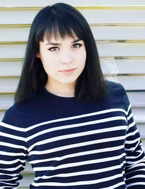 Feathered blunt bangs hairstyle