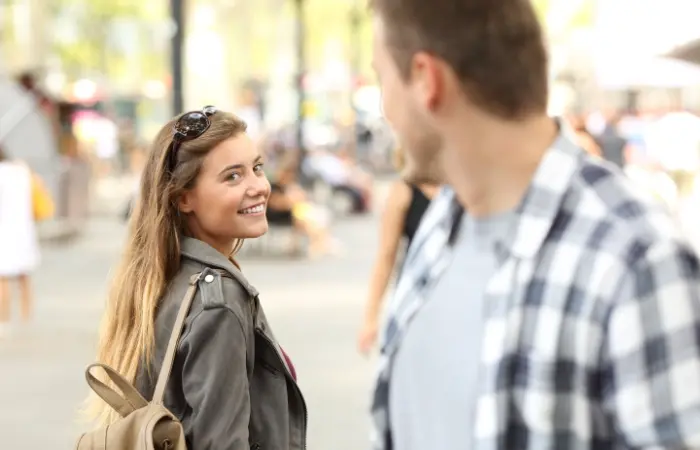  A girl and a guy looking at each other