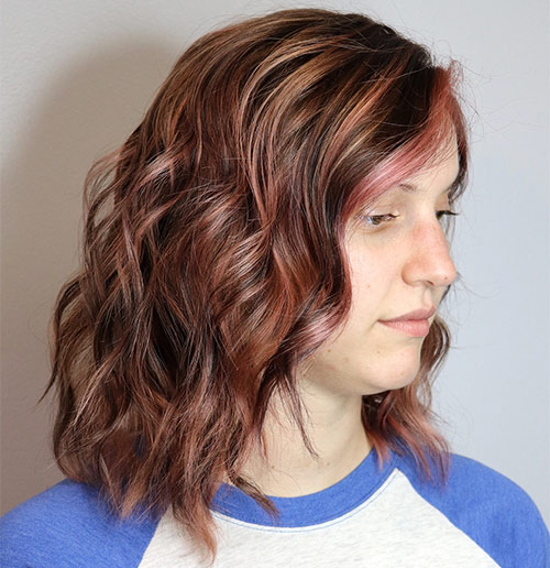 Vibrant rose brown hair color with partial highlights