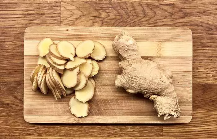 Woman preparing ginger water at home for diarrhea