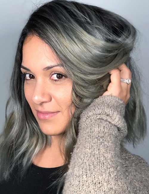 Gray hair with feathered ends medium length haircut