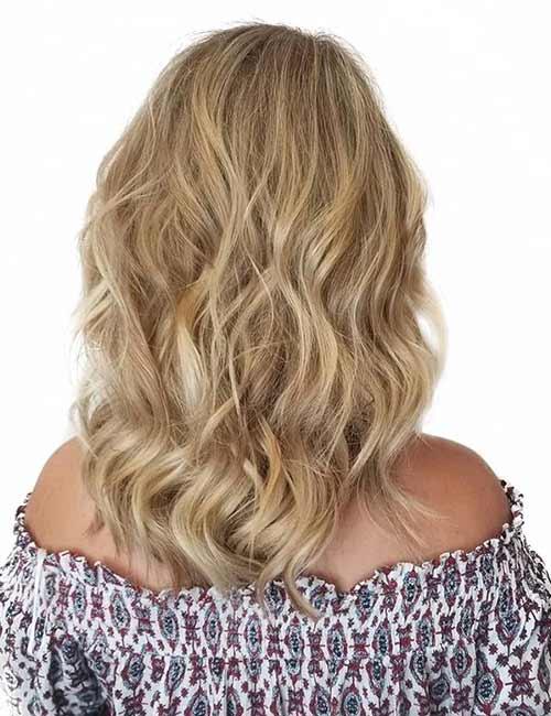 Layered style medium length haircut