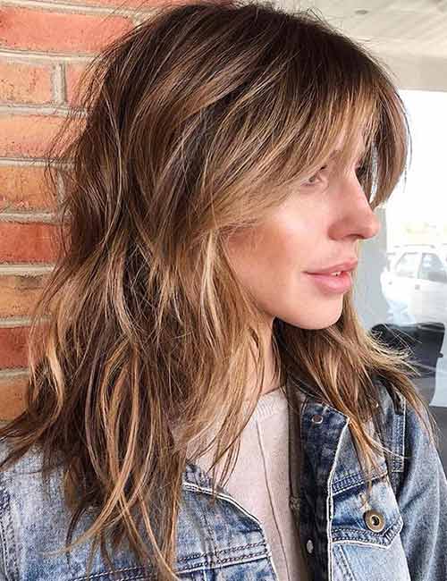 Layered cut with thinned out ends medium length haircut