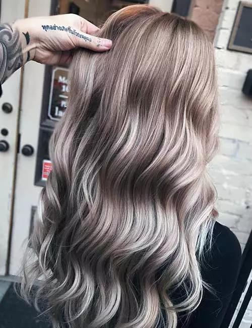 Ash blonde balayage winter hair color