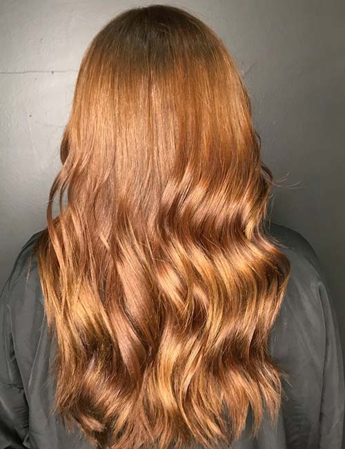 Brown winter hair color with hints of auburn