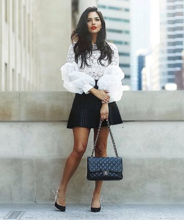 Black leather skirt and white ruffle top