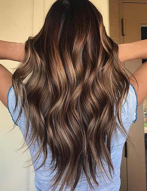 Winter hair color with caramel highlights