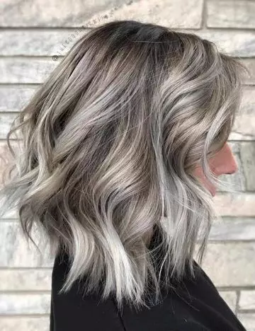 Icy blonde balayage winter hair color