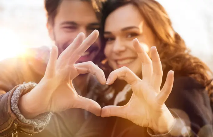 A couple making a heart