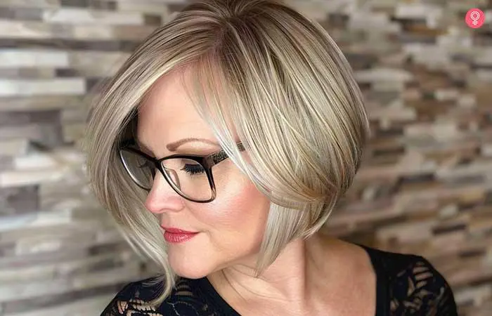 Asymmetrical bob hairstyle for older women with glasses