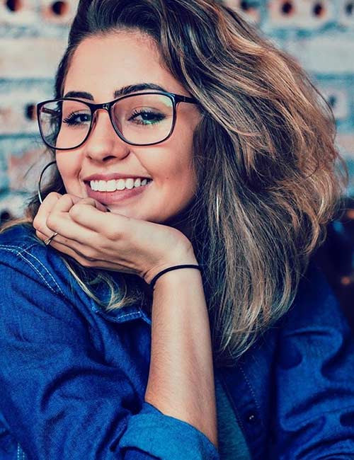 Balayage hairstyle for women with glasses