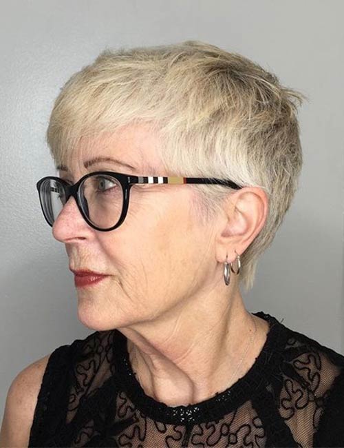 Classic pixie hairstyle for older women with glasses