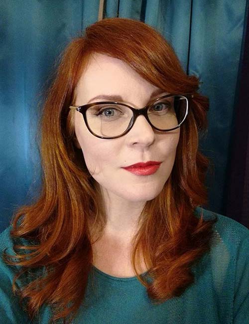 Ends flicked outside hairstyle for women with glasses