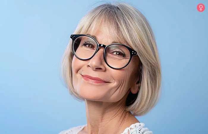 Layered lob hairstyle for older women with glasses