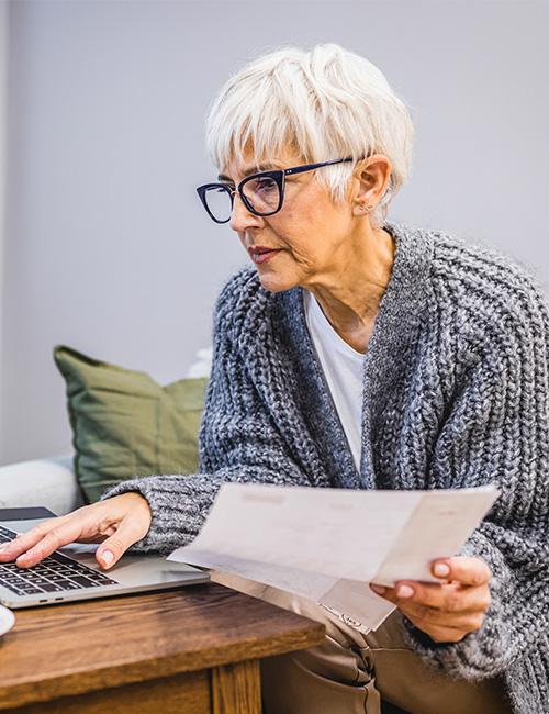 Messy pixie hairstyle for older women with glasses