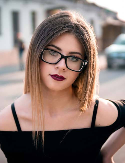 Middle parting hairstyle for women with glasses