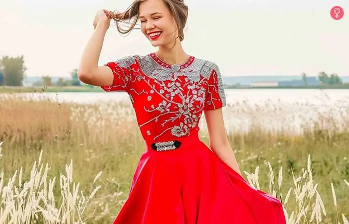 Women in red and silver outfit