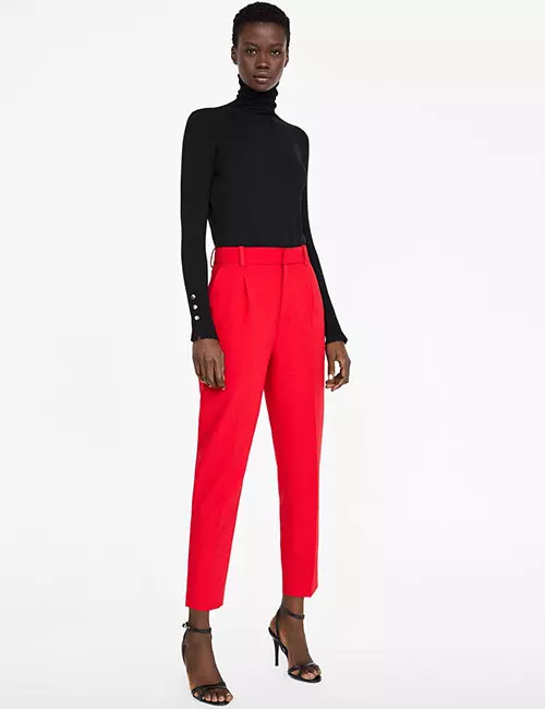 Red cigarette pants and black crew neck