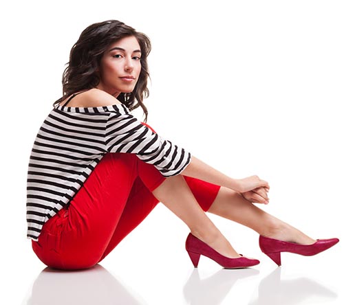 Red pants with black and white striped top