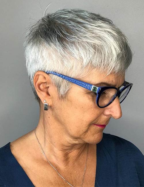 Silver fox pixie hairstyle for older women with glasses