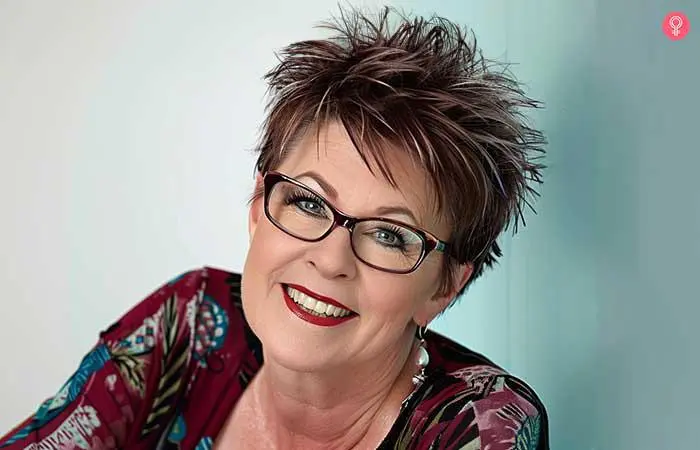 Spunky pixie hairstyle for older women with glasses